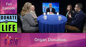 Picture of hosts from Cycle of Health around a table talking.